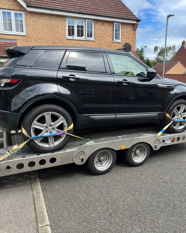 Range Rover Evoque strapped at the wheels